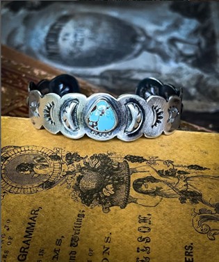 Silver cuff bracelet with turquoise stone