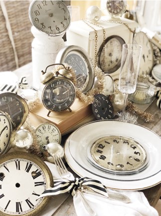 Table setting with multiple vintage clocks